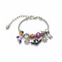 Detail of silver Halloween charms on a chain bracelet