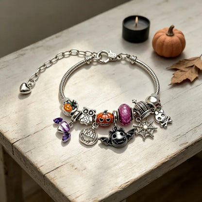 Halloween charm bracelet in silver with pumpkin and bat charms